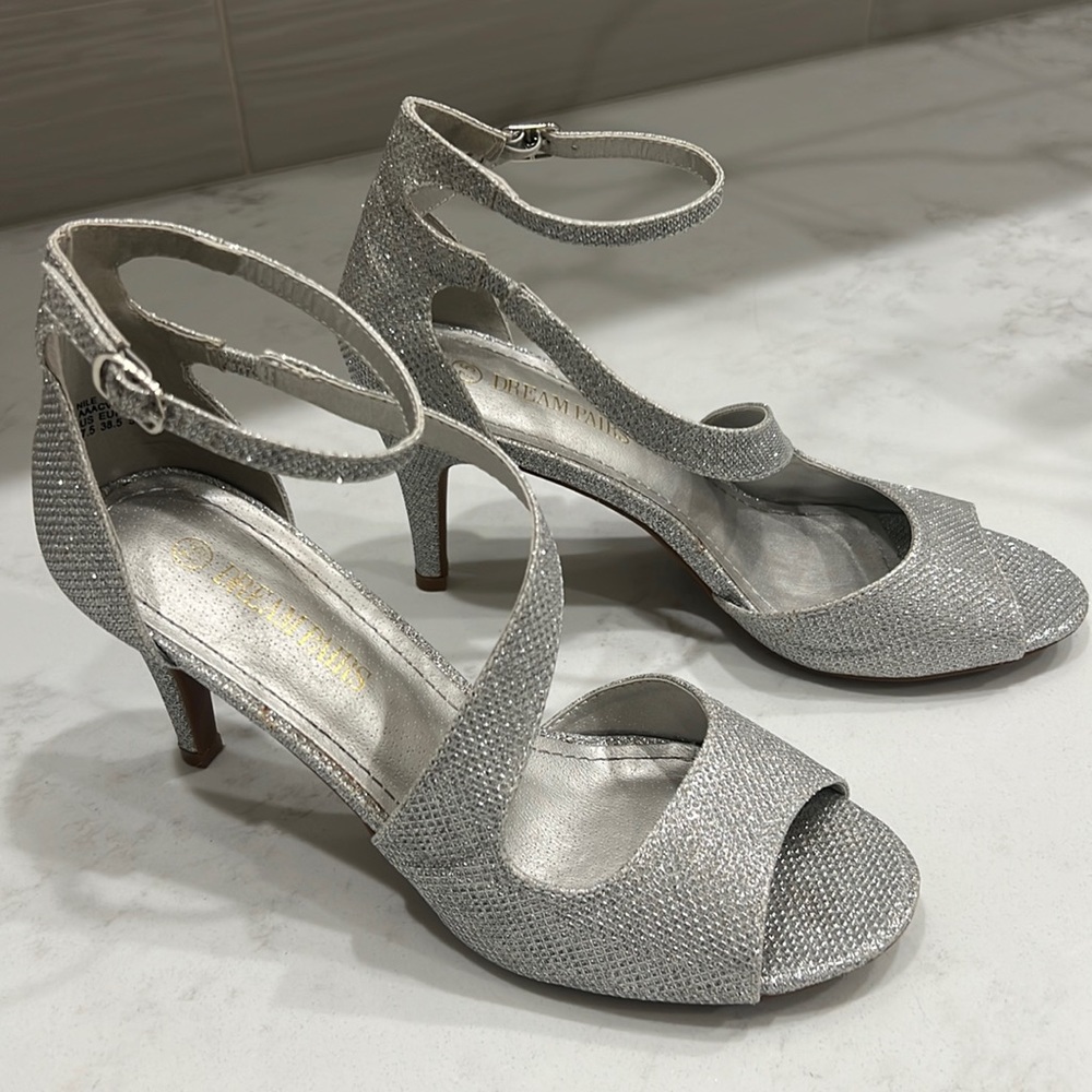 Woman’s silver glitter, high heels, size 7 1/2 by dream pairs